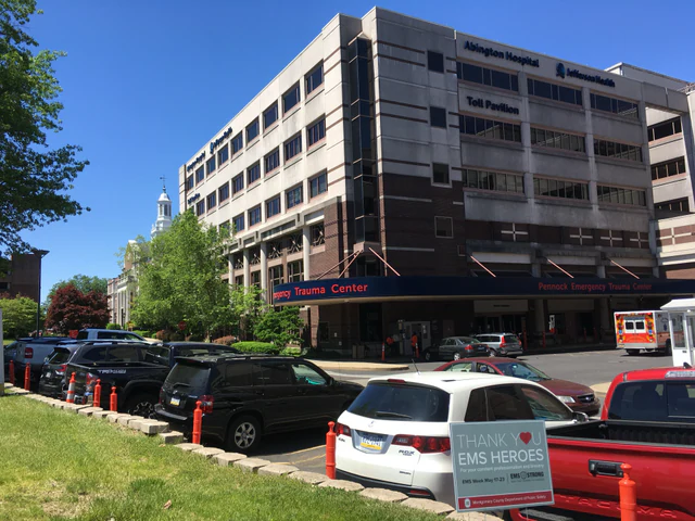 Emergency entrance and ambulance driveway outside Abington Hospital in Pennsylvania, with no people visible