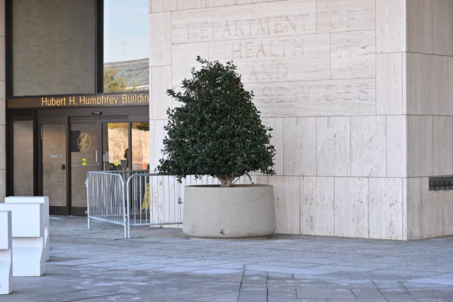 Entrance and sign at the U.S. Department of Health and Human Services headquarters in Washington, D.C.
