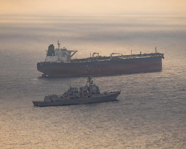 USS Rafael Peralta at sea while enforcing a maritime blockade against an Iranian-flagged ship