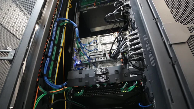 Rows of server racks inside the CyrusOne data center in Carrollton, Texas